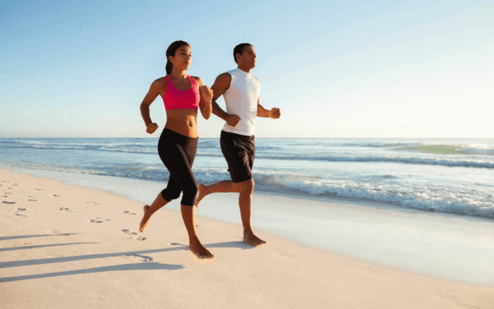 Running on the beach image