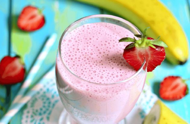 Healthy Fruit Smoothie with strawberry on top